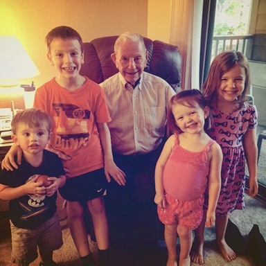 J.C.Rowe with his great grandchildren.jpg